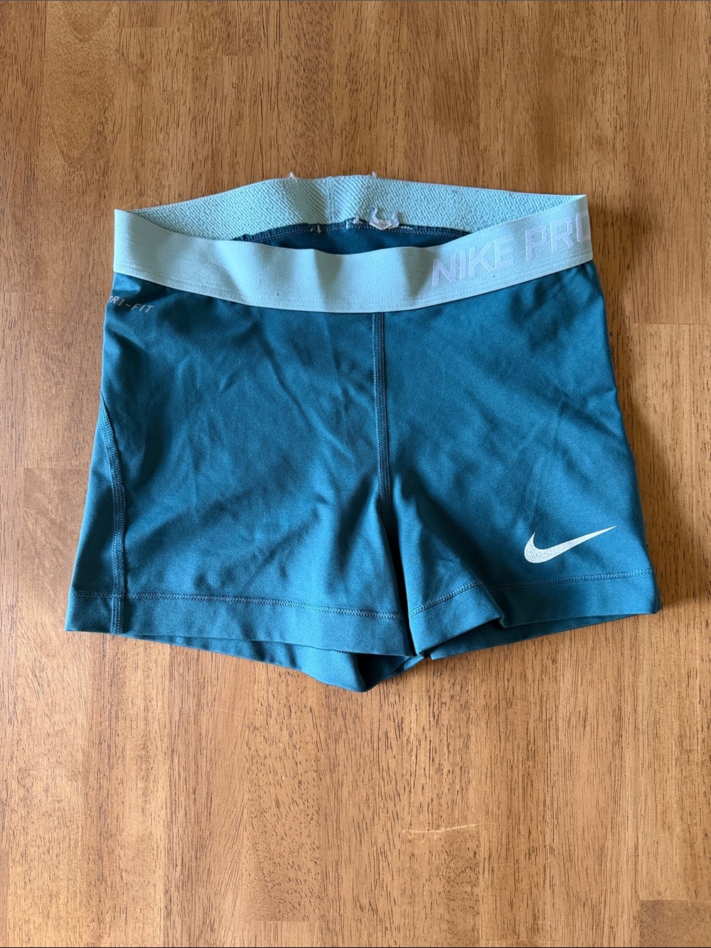 Nike Pro Women's Teal Athletic Shorts with Light Teal Waistband